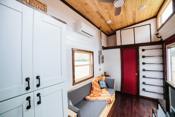 a tiny home with storage spaces