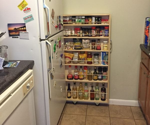 a small pantry beside the fridge